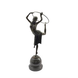 Art Deco style bronze figure of a dancer standing on one leg with a hoop above her head, after 'Chiparus', with foundry mark, H52cm overall