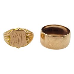 Early 20th century gold shield design signet ring, initialled J.W, Birmingham 1915 and a rose gold wide wedding band, both hallmarked 9ct