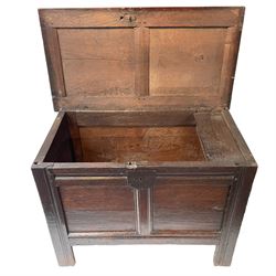 18th century oak coffer, double panelled front and lid, the interior fitted with small candle box, moulded frame and stile supports