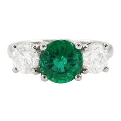 18ct white gold three stone emerald and round brilliant cut diamond ring, hallmarked, total diamond weight approx 1.30 carat, emerald approx 1.35 carat