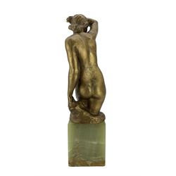 Art Deco style bronze figure of a female nude, her arm shielding her face, indistinctly signed, on green onyx square section base, H34.5cm 
