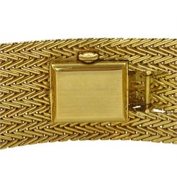 Garrard 18ct gold ladies manual wind wristwatch, the watch concealed by knot design cover, on integral herringbone link bracelet, London 1958, boxed
