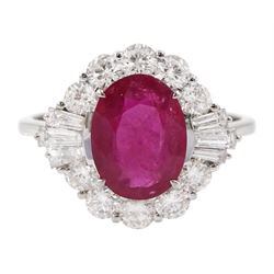 18ct white gold oval cut ruby, round and baguette cut diamond cluster ring, stamped 750, ruby 1.78 carat, total diamond weight 0.88 carat, with World Gemological Institute Report