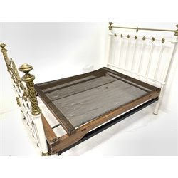 Victorian white painted iron and brass double bedstead, with cast spiral and leaf decoration, raised on castors, together with a Dreamworld mattress