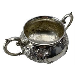 Victorian silver two handled sugar bowl with embossed decoration, cartouche engraved with a monogram Sheffield 1859 Maker Martin Hall & Co
