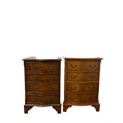 Two mahogany serpentine chests of drawers