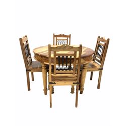 Mexican pine circular dining table raised on turned supports (D111cm, H77cm) with set four of matching chairs