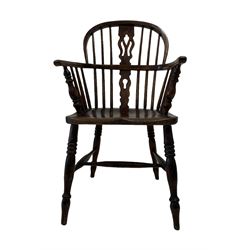 19th century low back Windsor chair, the splat and spindle back over elm seat, raised on turned supports united by a stretcher 