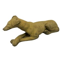 Pair cast stone recumbent whippets 