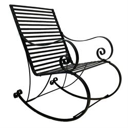 Wrought metal garden rocking chair, strap back and seat with scrolled arms and supports