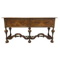 18th century design walnut dresser base, the rectangular top with moulded edge over two long drawers, raised on baluster supports united by a stretcher W168cm, H85cm, D45cm  