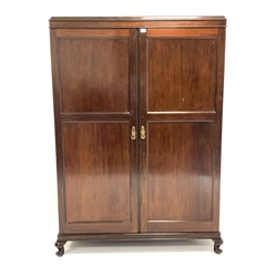 Early to Mid 20th century mahogany Gentlemen's compactum wardrobe fitted with shelves, drawers, adjustable mirror, hanging rail, hooks etc... with label 'Aw Lyn', W128cm, H184cm, D54cm