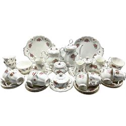 Royal Albert 'Tranquillity Rose' pattern tea service to include cups, saucers, cake plates, platters, jugs, sugar bowls etc. (37)