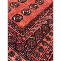 Persian design red ground rug, repeating gul motif on red field enclosed by multi line border,100cm x 160cm