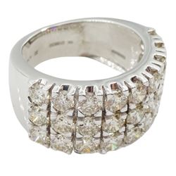 White gold three row round brilliant cut diamond half eternity ring, stamped 9K, total diamond weight 4.14 carat