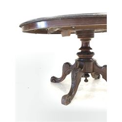 Victorian inlaid walnut oval tilt top loo table, raised on pedestal base with four leaf carved and splayed supports W132cm