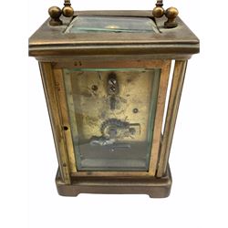 Early 20th century eight-day timepiece mantle clock with a Buren (Swiss) drum movement and rear case plate, platform escapement with integral key, drum movement housed in a shaped top maroon lacquered case with highlighted chinoiserie decoration, dial inscribed 