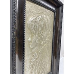 Near pair of Art nouveau plaques, both cast in low relief with female profiles, one indistinctly signed and dated, 39cm x 27cm 