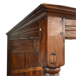 17th century design oak four-poster bedstead, projecting moulded cornice over moulded upper rails, the headboard with two over six panels, turned column front posts, with metal sprung base