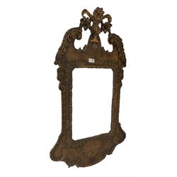 Georgian style wall hanging mirror, the walnut frame with carved urn and scrolled acanthus leaves,  dated 1714, London with crest to reverse 50cm 
 x 100cm
