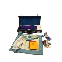 Suitcase and contents of Masonic regalia, silk and leather apron, sash, booklets etc