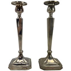 Pair Chinese silver candlesticks with tapering square section stems and square bases, Chinese marks and tests to 800 standard, H24cm