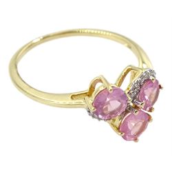 9ct gold three stone pink sapphire and diamond ring, hallmarked 