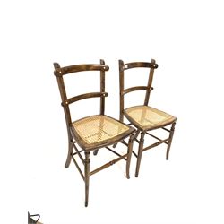 Pair of early 20th century beech side chairs with cane seat panel 
