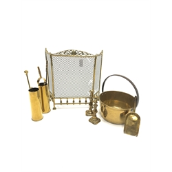 Brass and wire mesh folding spark guard, brass preserve pan D35cm, two brass shell cases, fire implements and a pair of brass candlesticks