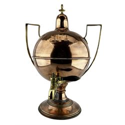 Early to mid 19th century copper and brass samovar, of two handled globular form on circular pedestal foot with brass tap and ebonised handle, H50cm
