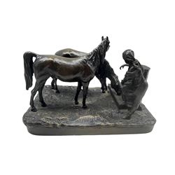 Vasili Grachev (Russian 1831-1905): Bronze group of a girl filling a jug at a well accompanied by two horses W23cm x D14cm x H16cm, with signature and Woerffel foundry mark. Provenance: 3rd Earl of Feversham
