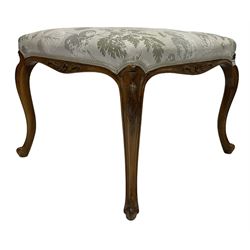 French style walnut stool, upholstered with foliate design fabric over base and legs with floral carvings