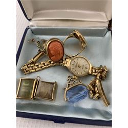 Gold coral ring, cameo ring, three gold charms, Chateau manual wind wristwatch, on gold strap, all 9ct, 18ct gold cameo brooch, 15ct gold cameo brooch, both stamped, amber bead necklace and a collection of costume jewellery and wristwatches