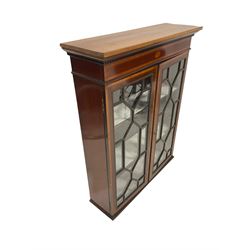 Edwardian and later Sheraton revival book case, the projecting cornice over two glazed doors of astragal design with satinwood bands, opening to reveal two adjustable shelves 