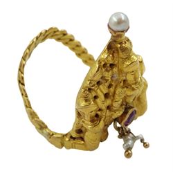 Gold stone set deity ring, tested between 20-22ct