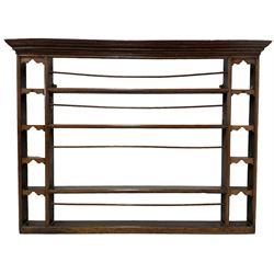 George III oak Delph rack, projecting cornice over four tiers flanked by four smaller shelves, each with fretwork arches, moulded frame