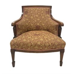 Edwardian tub chair, upholstered in red and golden fabric, raised on squared supports and peg feet H72cm, W60cm