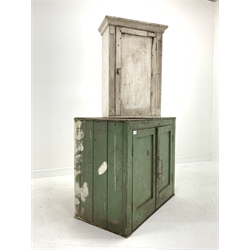  19th century green painted pine wall cupboard with two panelled doors enclosing two shelves, (W80cm H70cm D45cm) and another pine wall cupboard, (W43cm)  