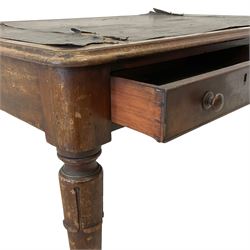 William IV mahogany library table, rectangular crossbanded top with inset writing surface, fitted with two cock-beaded frieze drawers with two faux drawers to the back, raised on lappet carved supports with brass castors