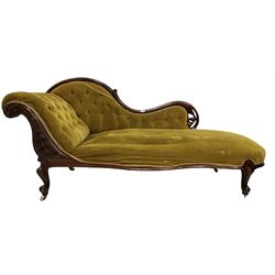 Victorian buttoned back chaise lounge, upholstered in citrine velvet, raised on cabriole supports, terminating in ceramic castors 