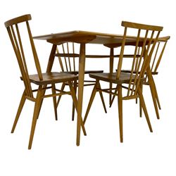 Ercol - mid-20th century elm and beech dining table, rectangular top over undertier, on splayed supports; together with set four ercol beech and elm dining chairs 
