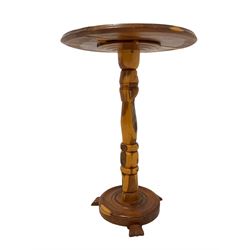 Yew wood pedestal table, circular figured top