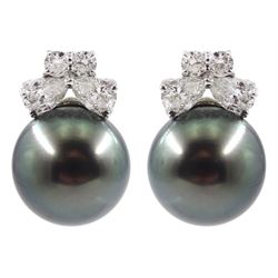 Pair of 18ct white gold Tahitian pearl and diamond stud earrings, each earrings set with a single pearl, two pear shaped diamonds and two round brilliant cut diamonds, stamped 18K 750, by Rosendorff, Australia, boxed