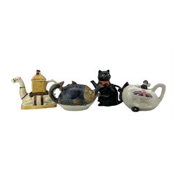 Four novelty teapots comprising a Victorian majolica novelty teapot and cover, in the form of a fish, Wood & Sons Cat, Carlton Ware Biplane and Tony Wood Camel, together with 'British Teapots & Drinking Tea' by Robin Emmerson  (5)