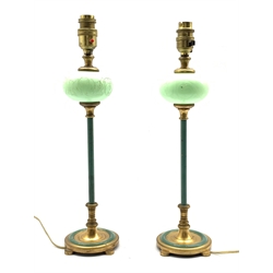 Pair of 1920s/30s brass table lamps, the slender stems  with gilt etched glass globes and turquoise decoration on circular bases and lappet feet H33cm 