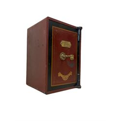 W E Brain & Co Manufacturers Birmingham - early 20th century painted cast iron safe, applied with a brass makers plaque and brass 'T' handle, fitted with main compartment over single interior drawer, in oxblood finish 