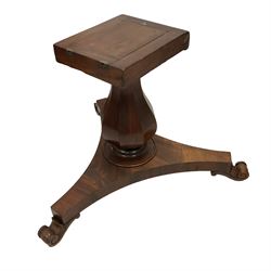 Early Victorian plum pudding mahogany and mahogany breakfast table, circular top with twelve segmented veneer panels, faceted vasiform pedestal on concaved triangular platform, on scroll carved feet with recessed castors (no pins)