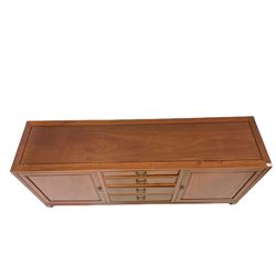 Chinese rosewood sideboard, the rectangular top over four graduated drawers, flanked by two cupboards, raised on square supports W183cm, H80cm, D36cm 