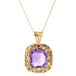 Gold cushion cut amethyst openwork pendant, on a 14ct gold fine link necklace