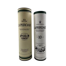 One bottle of Laphroaig 10 years old single Islay malt Scotch whisky, 1 litre 43% Vol and in cardboard tube, another 70cl 40% Vol in cardboard tube